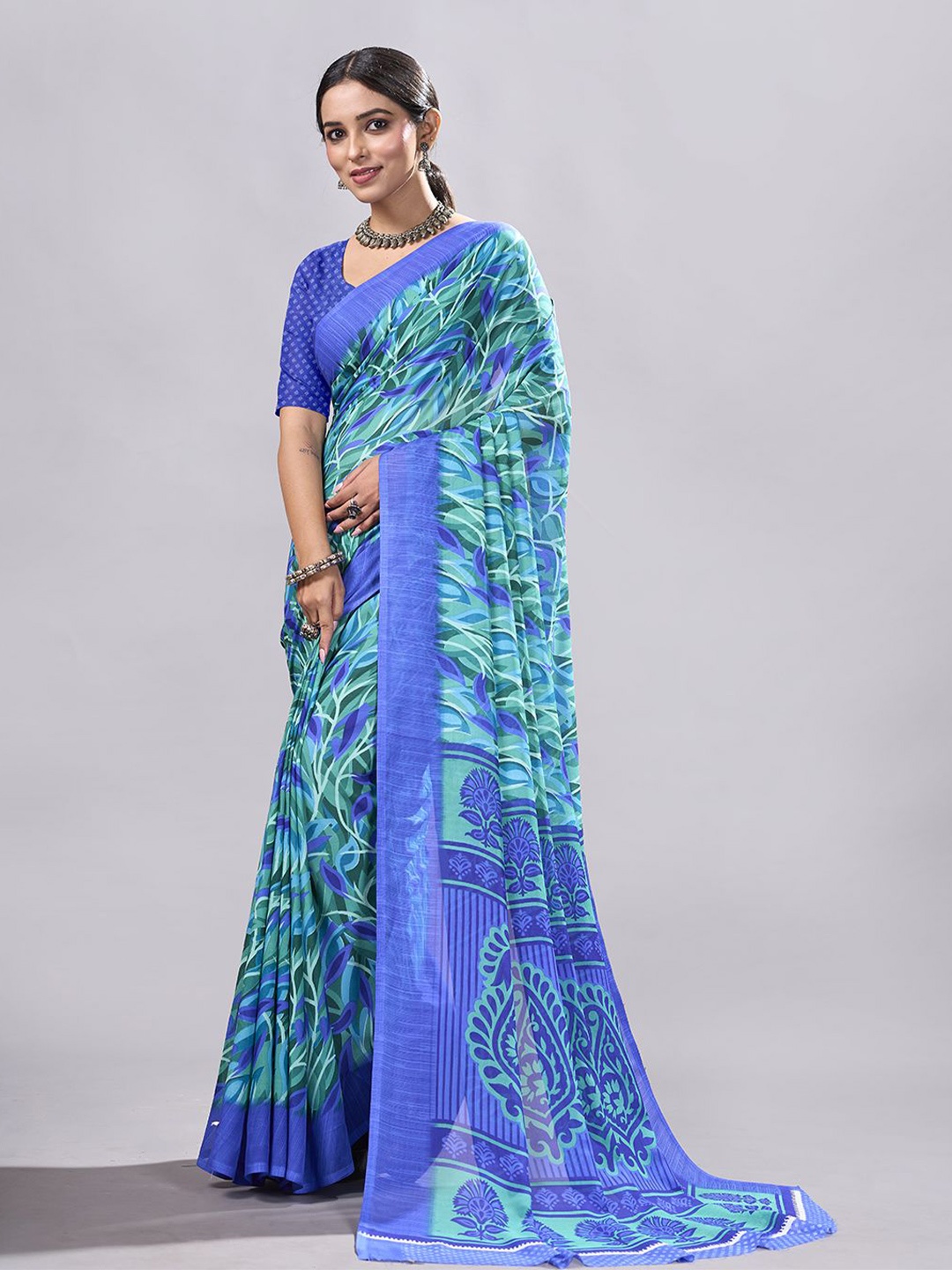 

NIRMAL CREATION Floral Poly Georgette Saree, Turquoise blue