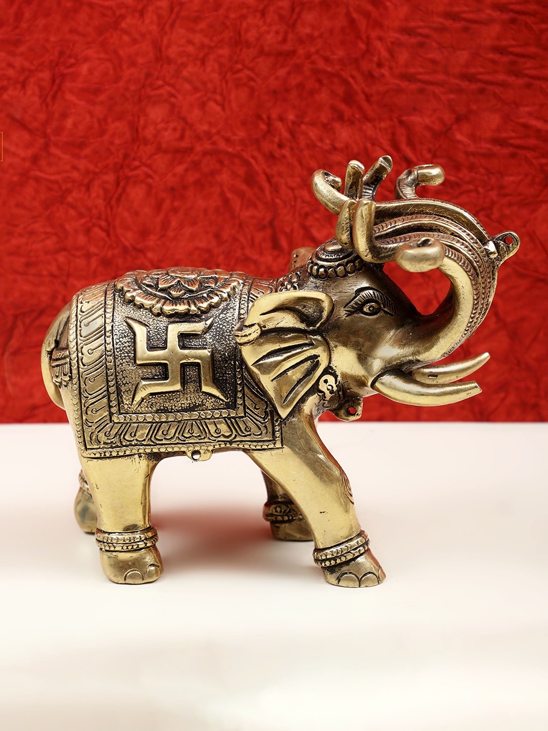 

Exotic India Gold-Toned Religious Elephant Idol Brass Showpiece