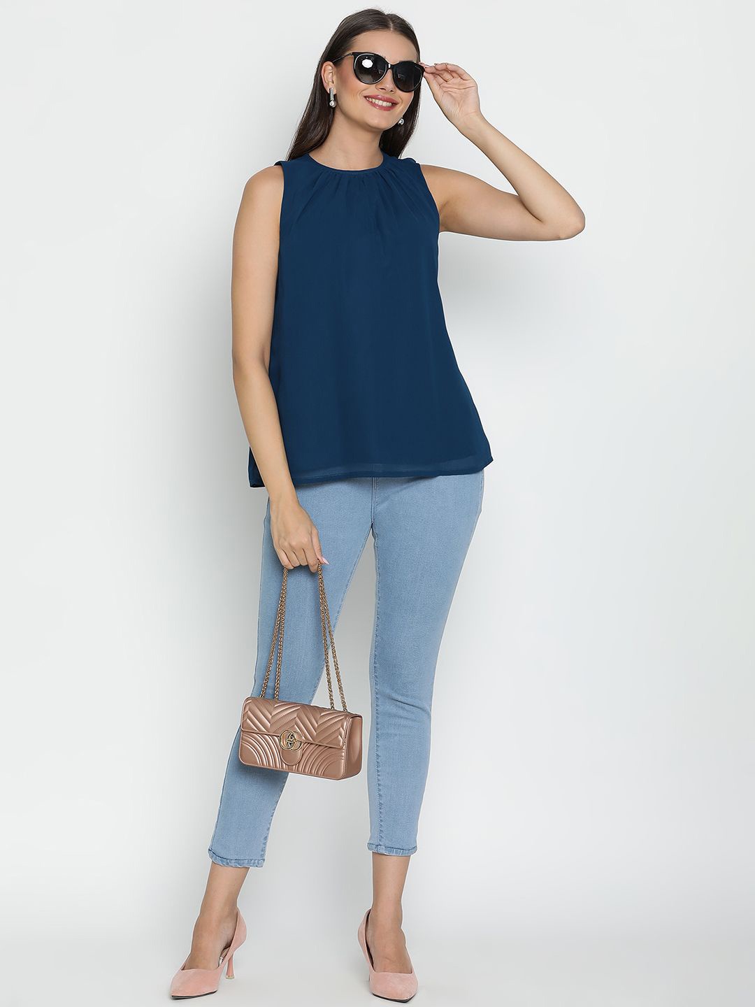 

DRAAX Fashions Women Solid Round Neck Top, Blue
