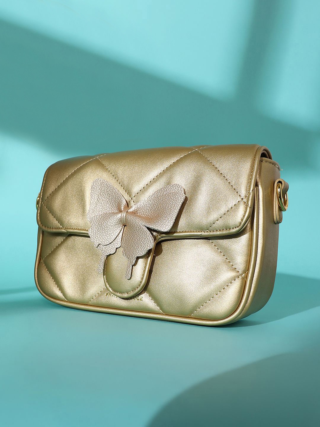 

HAUTE SAUCE by Campus Sutra Leather Structured Shoulder Bag with Tasselled, Gold