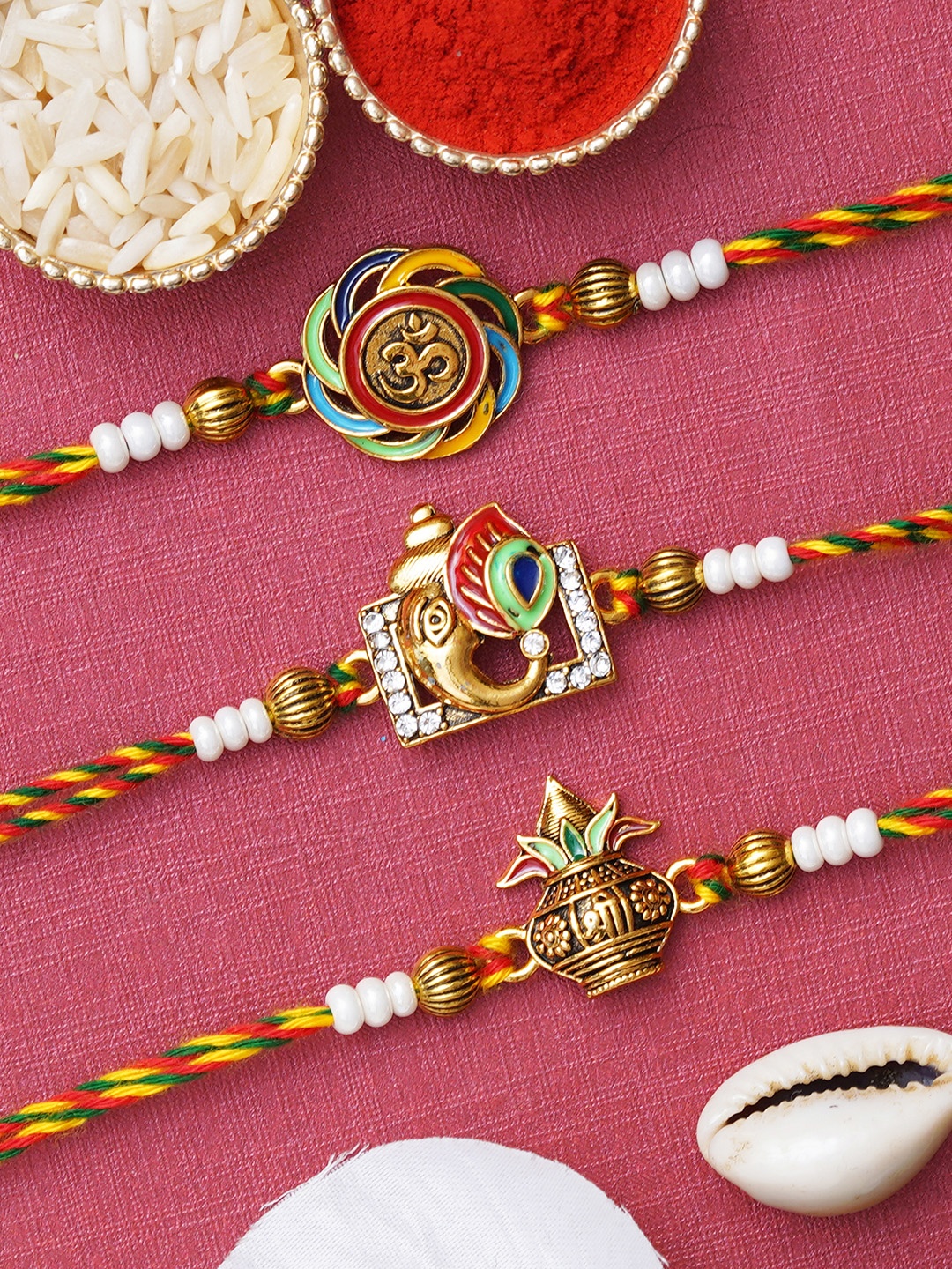 

eCraftIndia Set of 3 Om Lord Ganesha Kalash Designer Rakhis with Roli & Chawal, Yellow