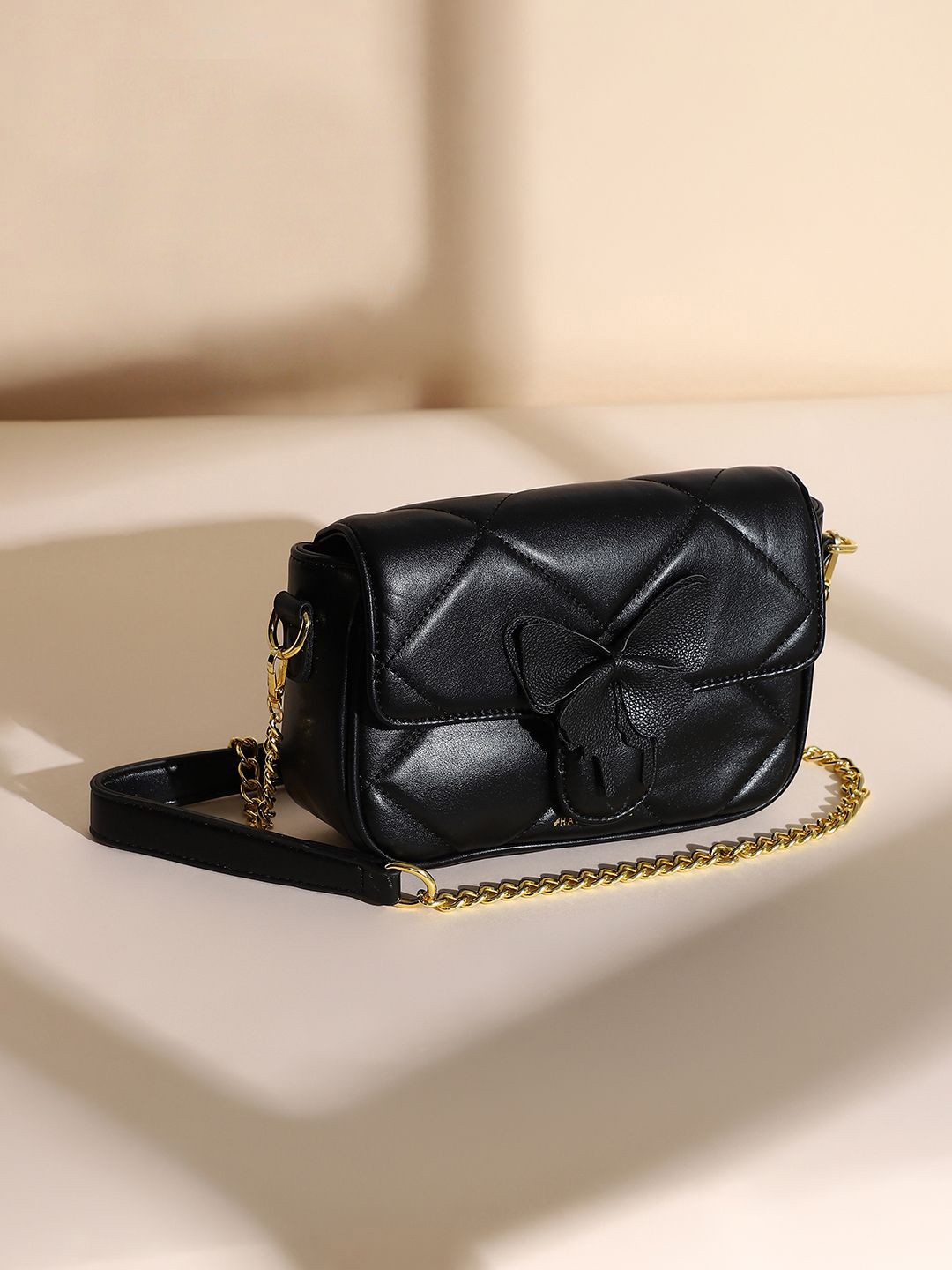

HAUTE SAUCE by Campus Sutra Leather Structured Sling Bag with Bow Detail, Black