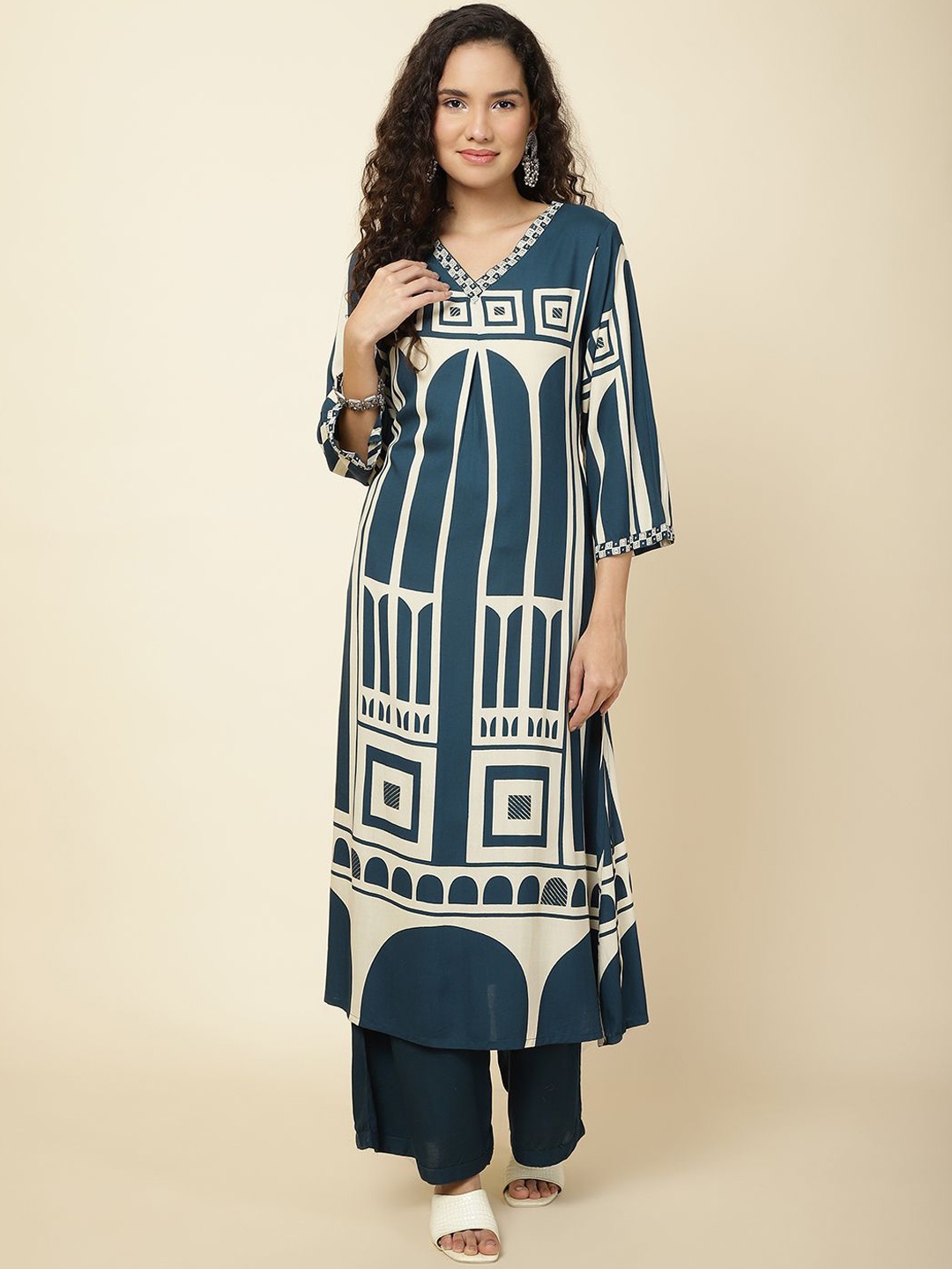 

Meena Bazaar Women Printed Regular Kurta with Trousers, Teal