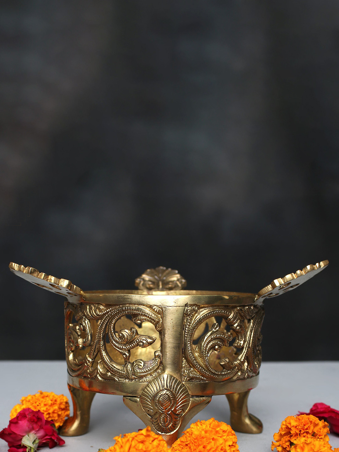 

Exotic India Gold Toned Brass Decorative Urli Stand