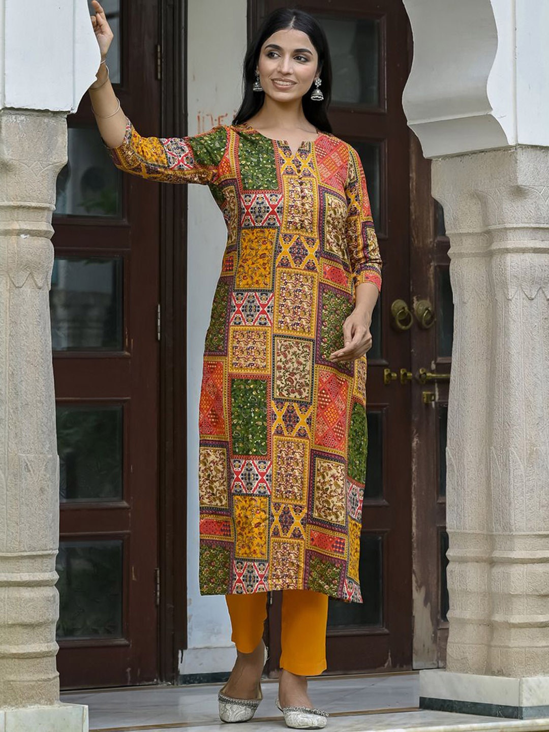 

Anni Designer Women Ethnic Motifs Printed Regular Kurta with Trousers, Yellow