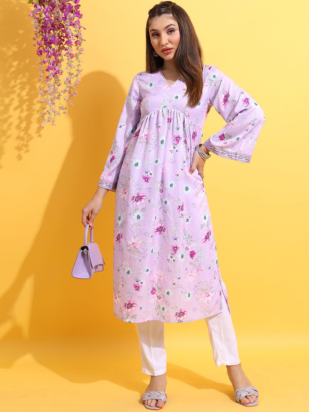 

Vishudh Women Floral Dyed Flared Sleeves Kurta, Lavender