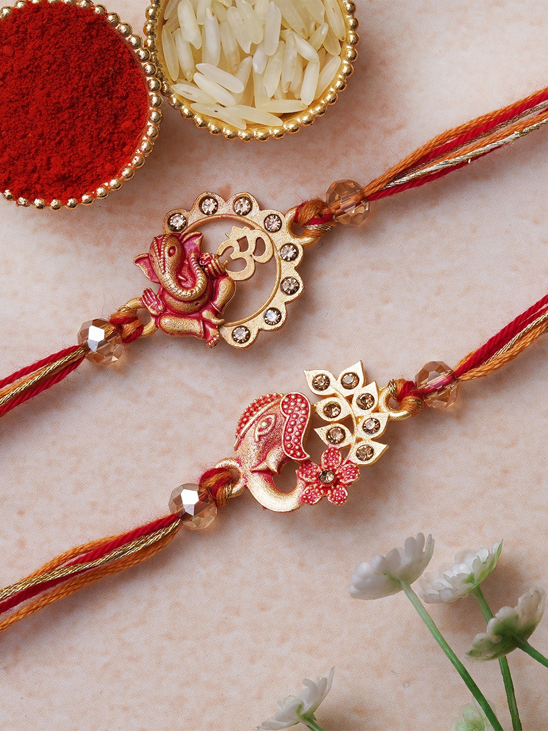 

eCraftIndia Set of 2 Lord Ganesha & Om Symbol Religious Designer Rakhis with Roli & Chawal, Multi