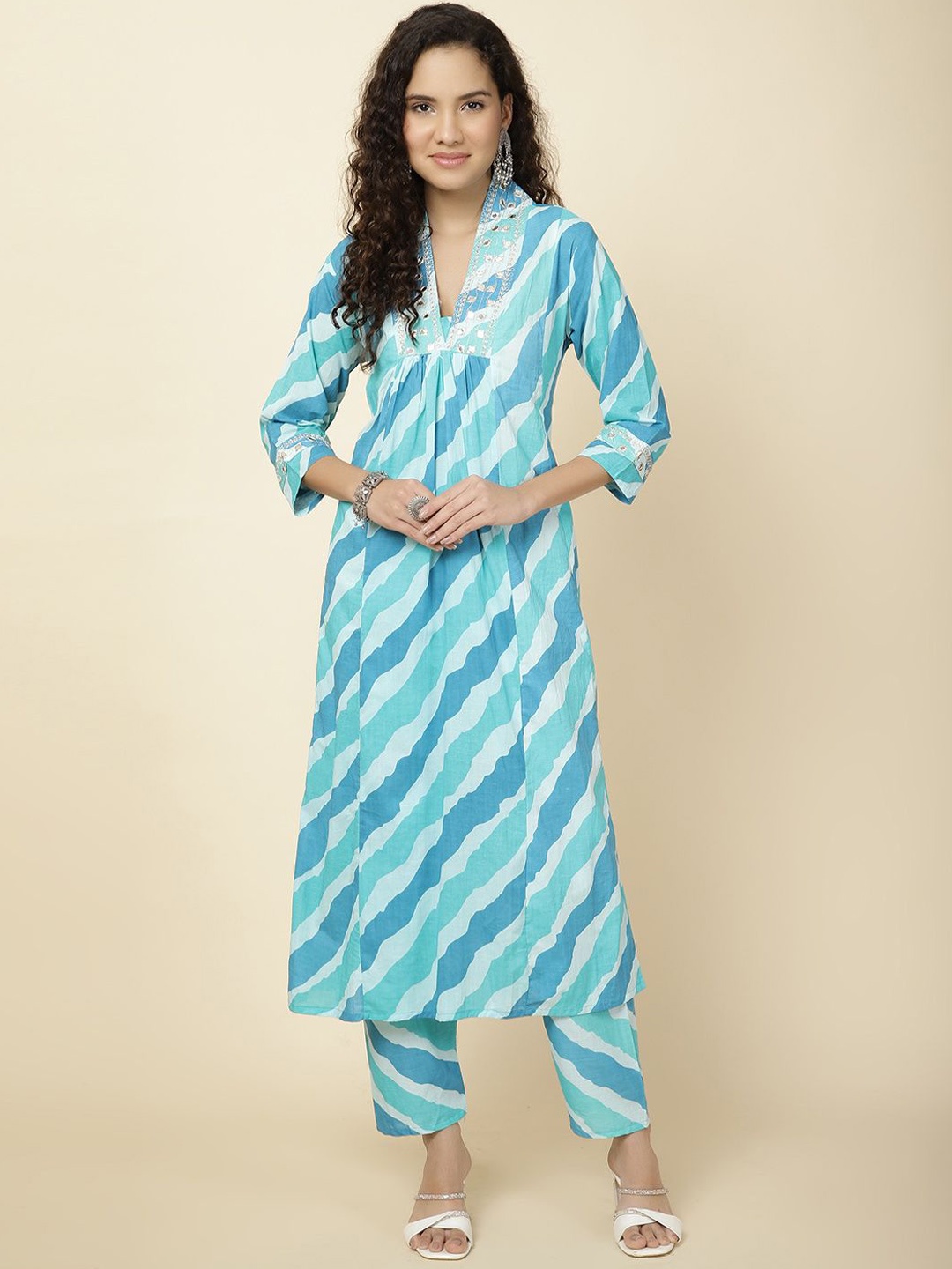 

Meena Bazaar Women Leheriya Printed Regular Thread Work Kurta with Trousers, Sea green