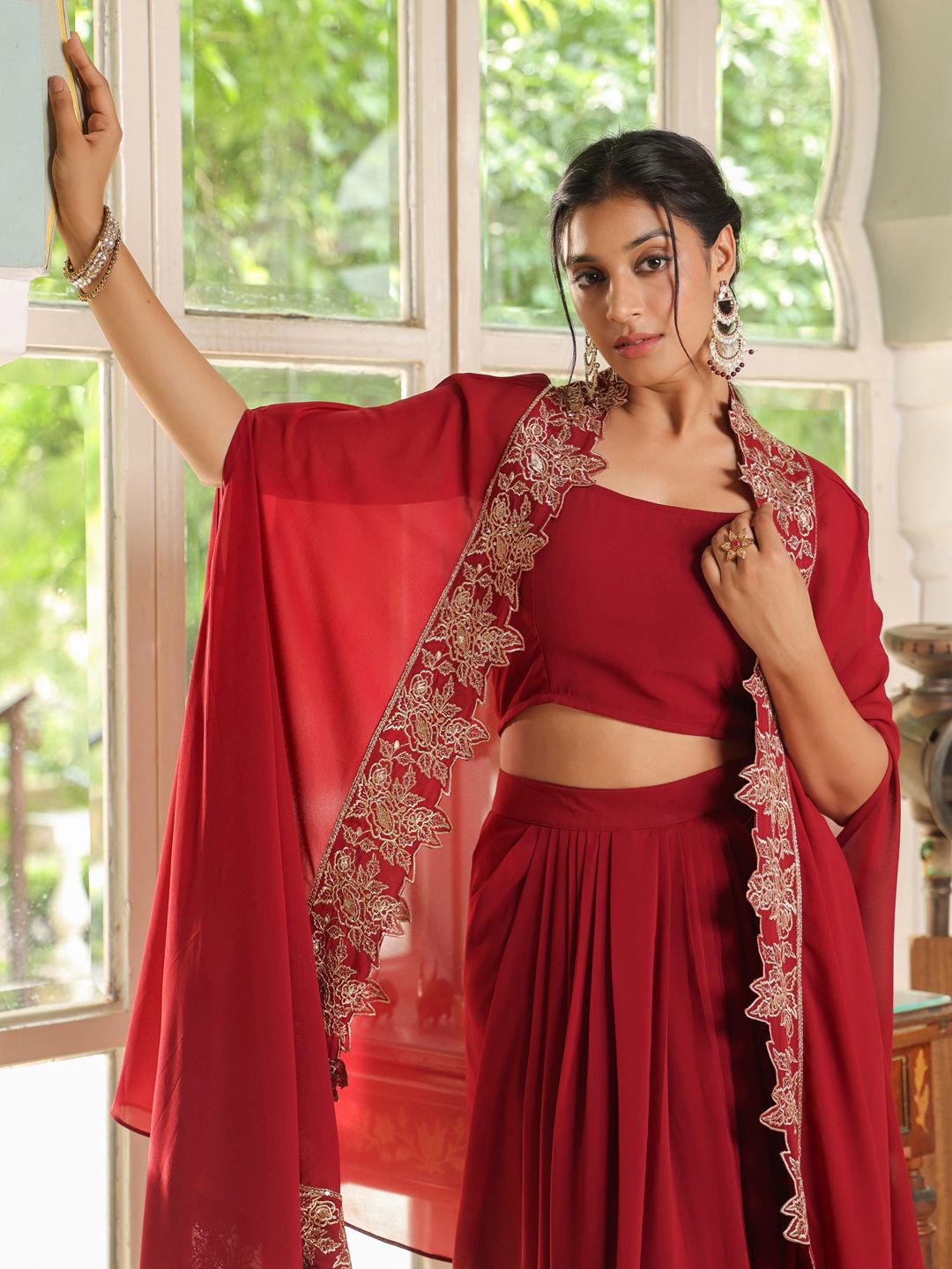 

Janasya Women's Maroon Georgette Zari Embroidered Crop Top With Skirt & Cape Set