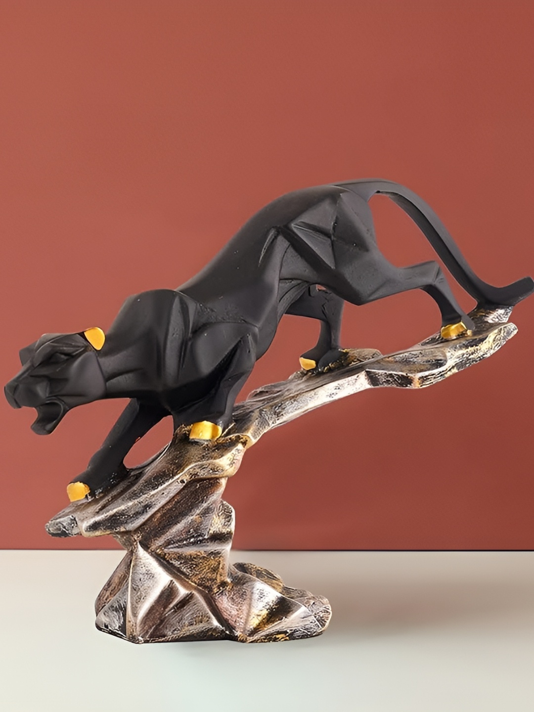 

Zart Copper-Toned Figurine Showpiece