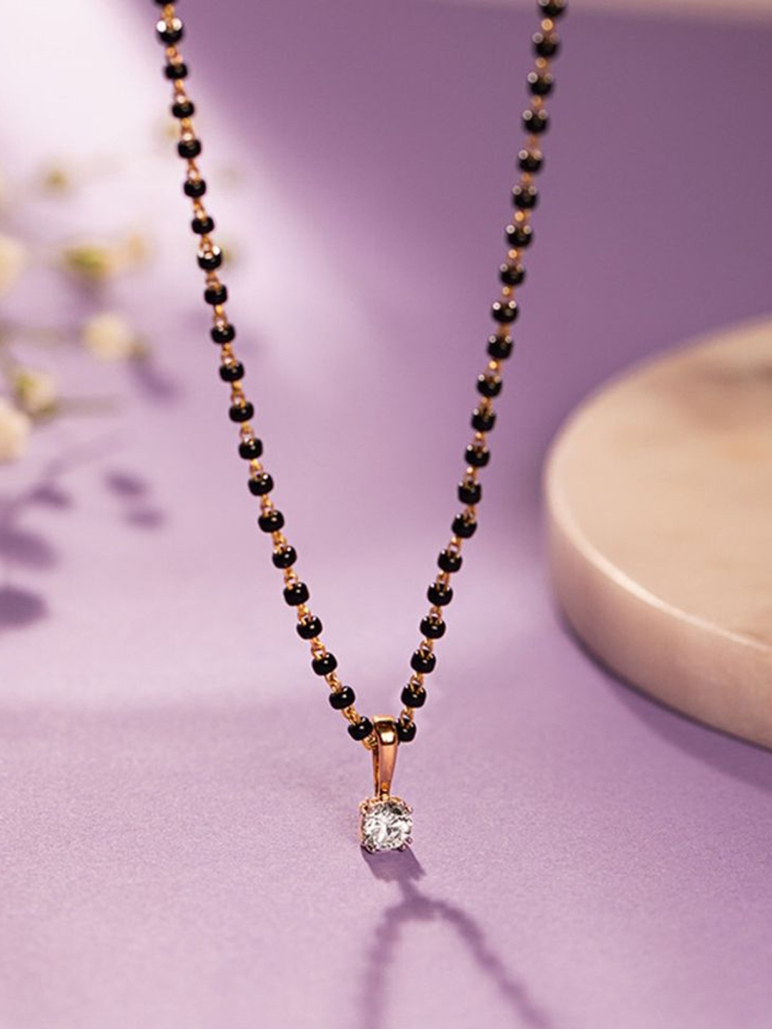 

Wynona Set Of 2 Gold-Plated American Diamond Studded & Beaded Mangalsutras