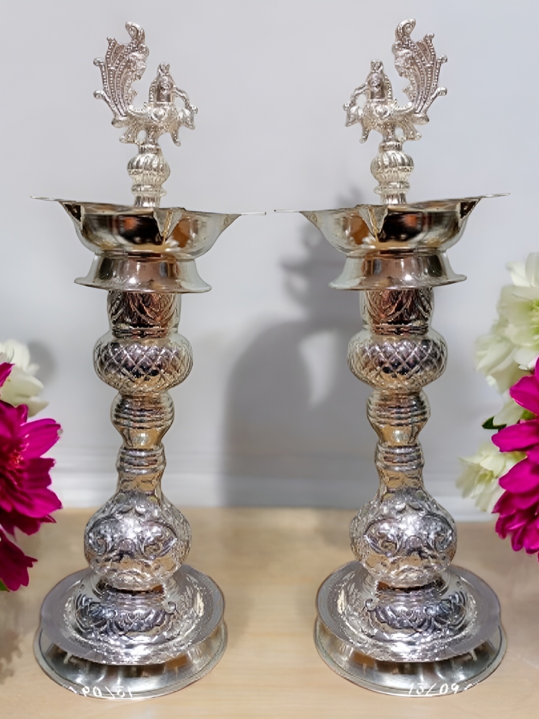 

Sigaram Silvertoned 2 Pieces Glossy Pure German Silver Peacock Diyas
