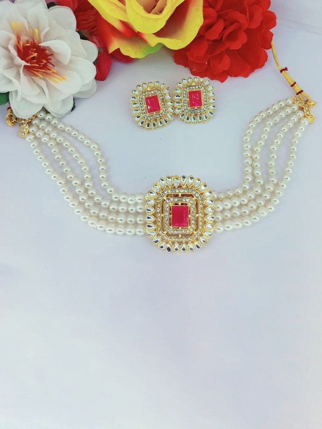 

Gyaan Jewels Gold-Plated Stone Studded & Beaded Necklace and Earrings