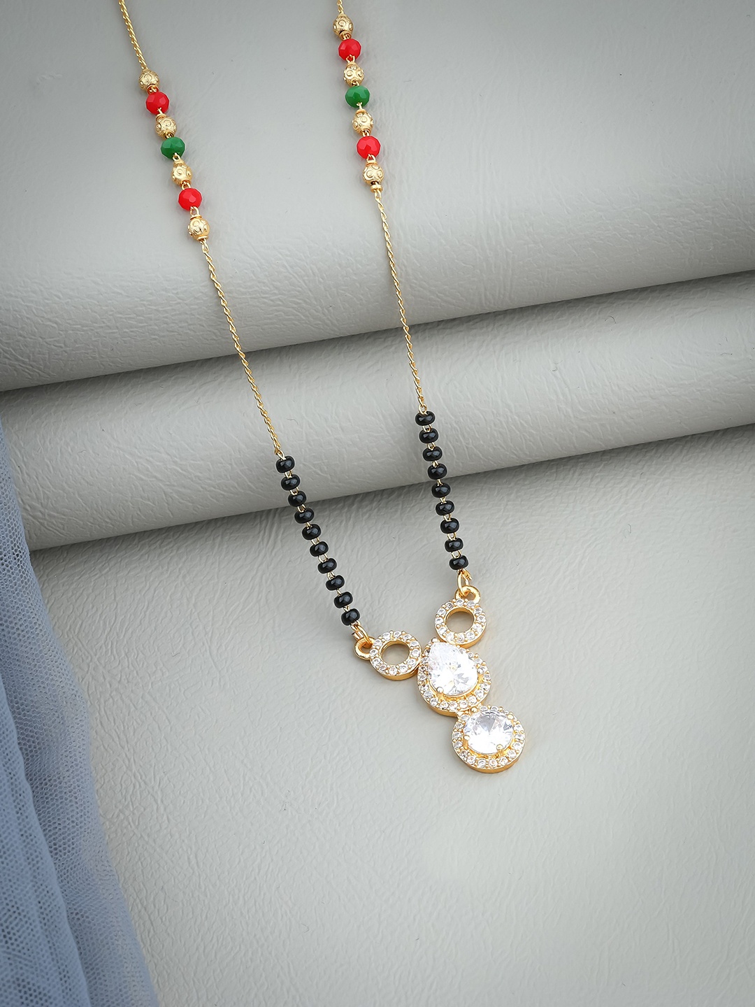 

Wynona Gold Plated American Diamond Stone Studded & Beaded Mangalsutra