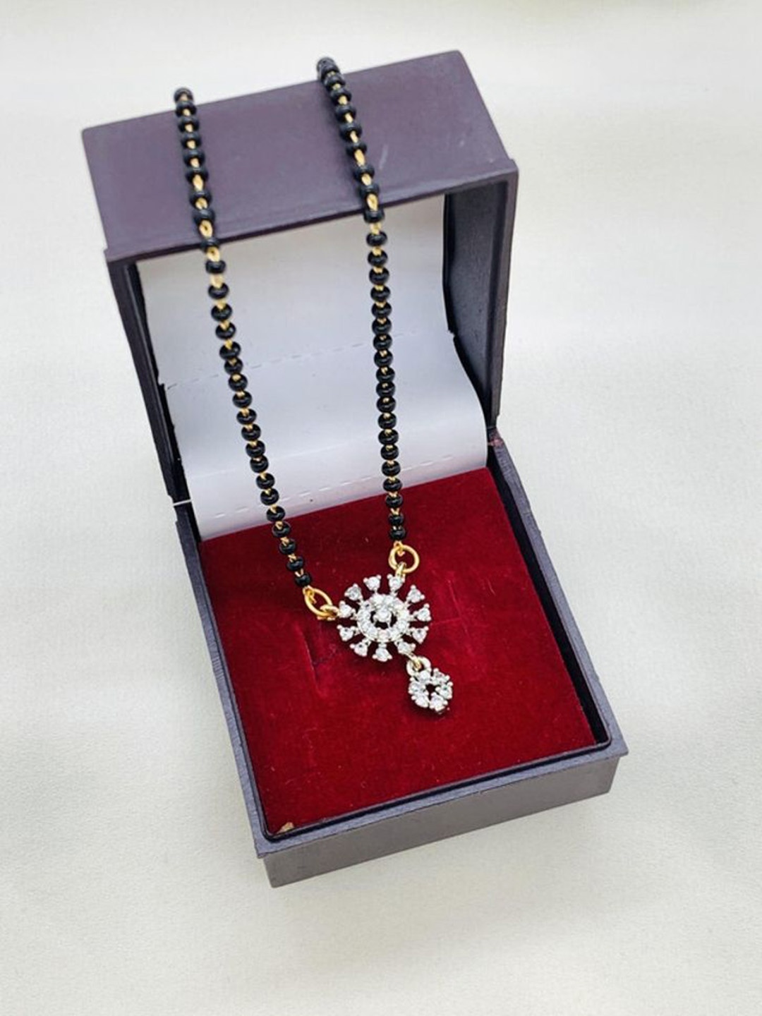 

Wynona Gold-Plated American Diamond & Beaded Mangalsutra