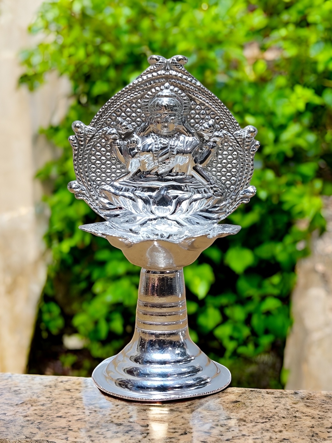 

Sigaram Silvertoned Glossy Brass Laksmi Diya, Silver