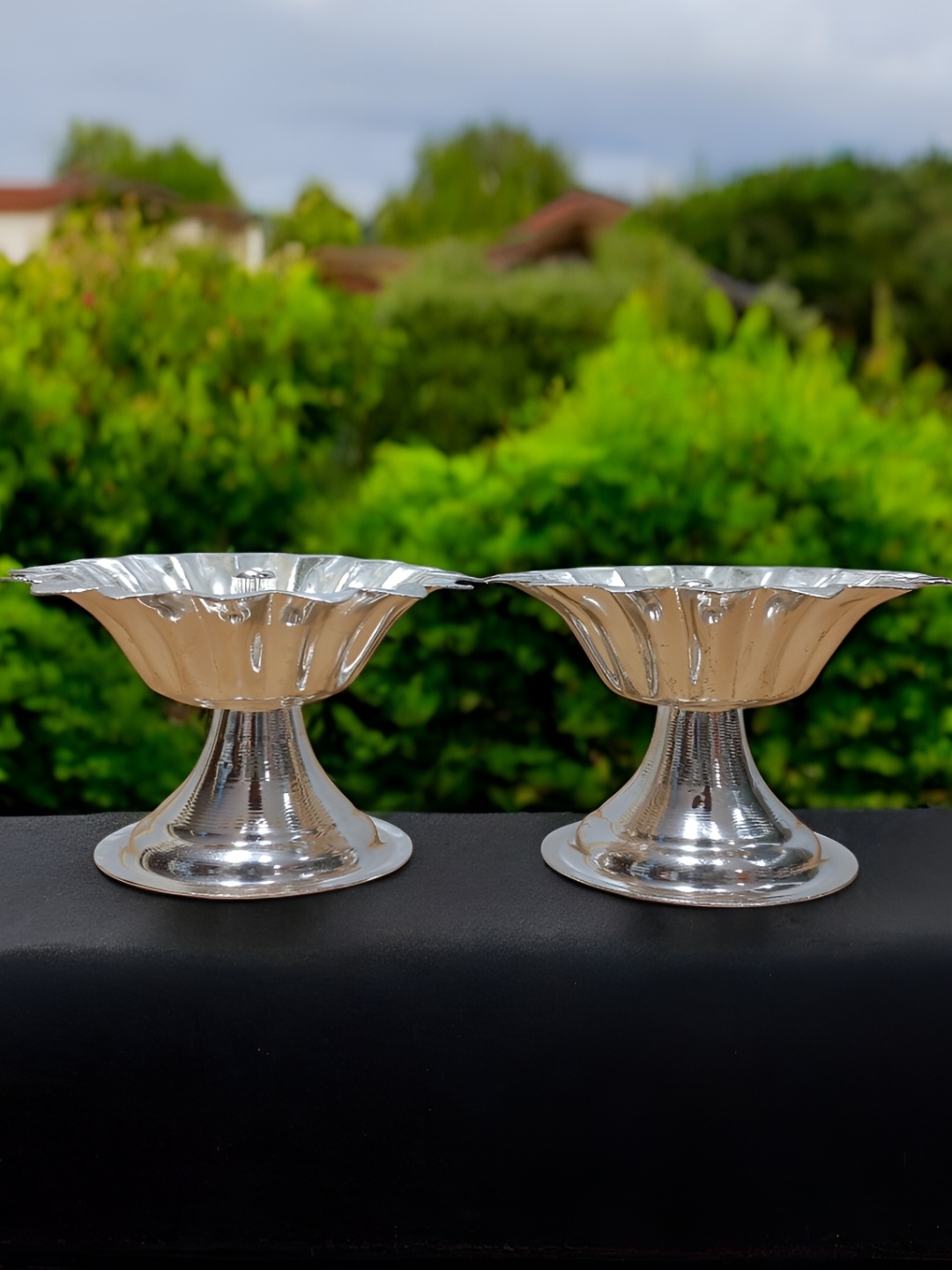 

Sigaram Silvertoned 2 Pcs Glossy Brass Flower Diyas, Silver