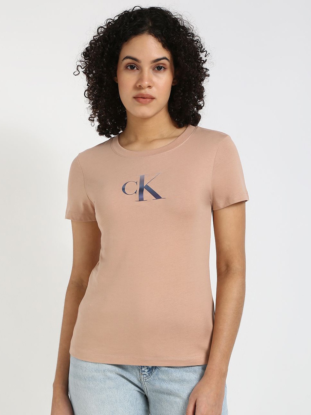 

Calvin Klein Jeans Women Typography Printed Round Neck Cotton Slim Fit T-shirt, Beige