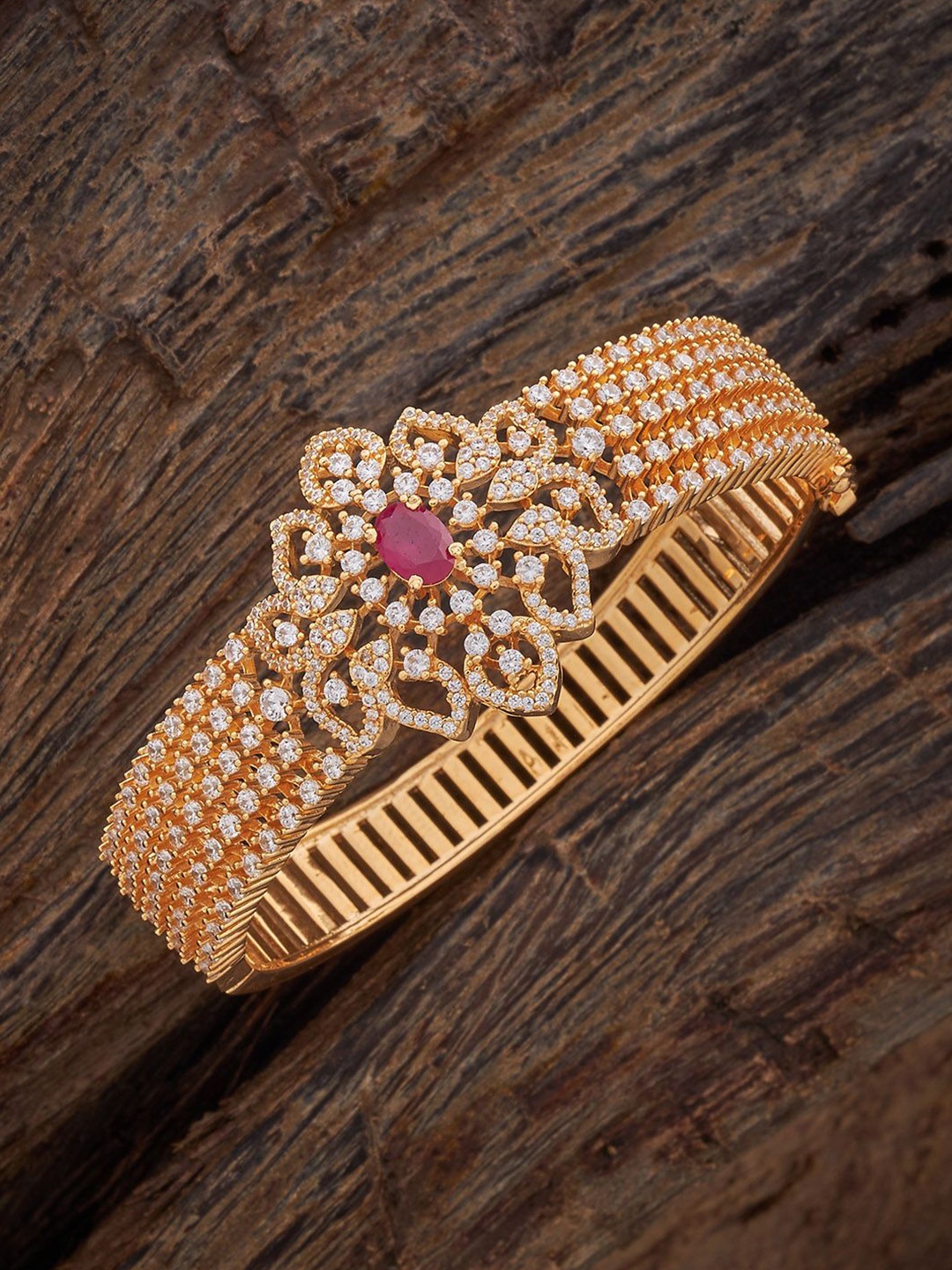 

Kushal's Fashion Jewellery Gold Plated Cubic Zirconia Studded Kada Bracelet