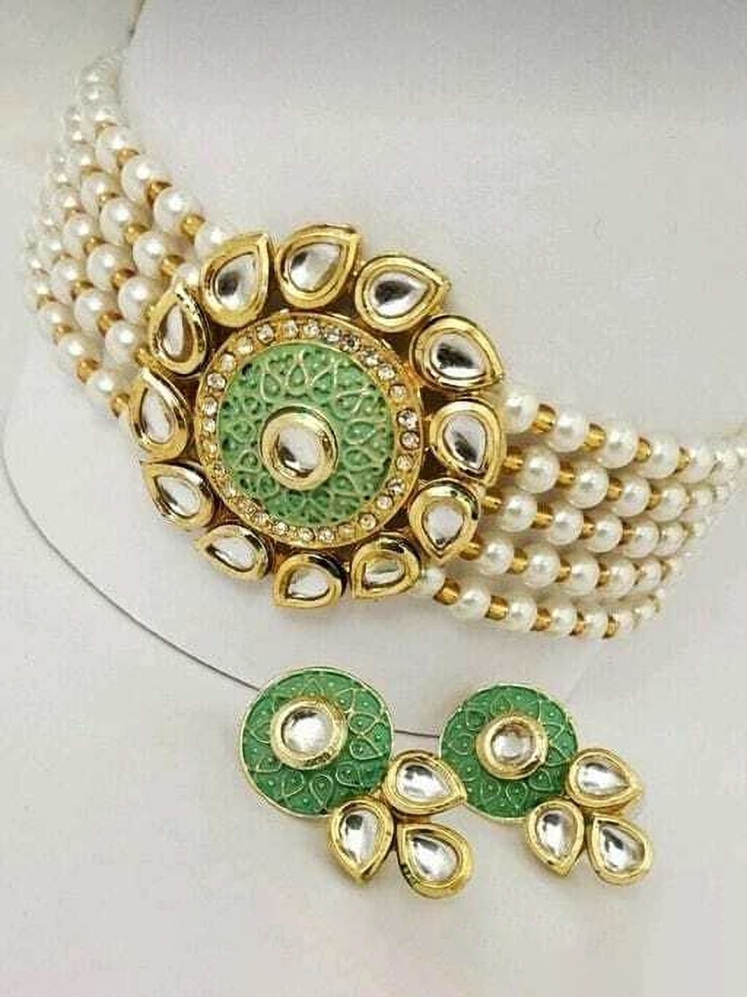 

Gyaan Jewels Gold-Plated Stone-Studded & Beaded Jewellery Set