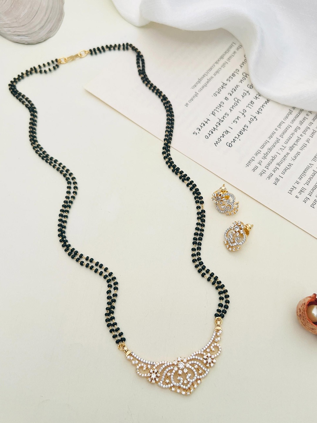 

ABDESIGNS Gold Plated American Diamond Studded Beaded Mangalsutra With Earrings