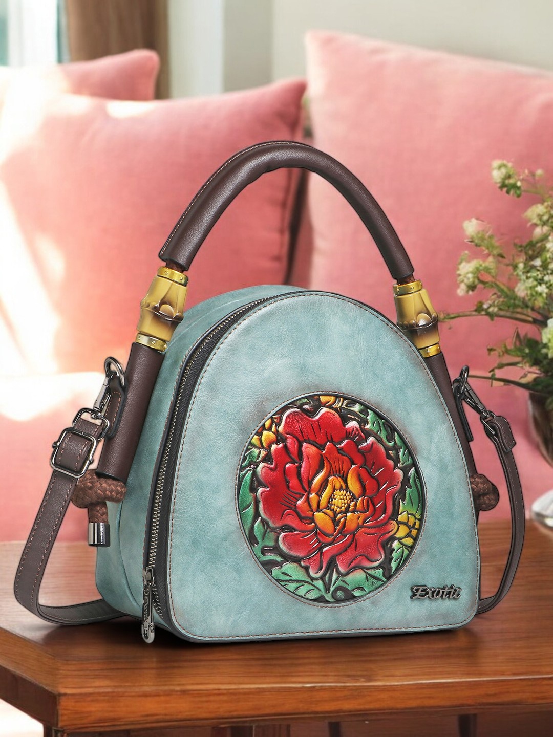 

Exotic Women Solid Structured Handheld Bag, Blue