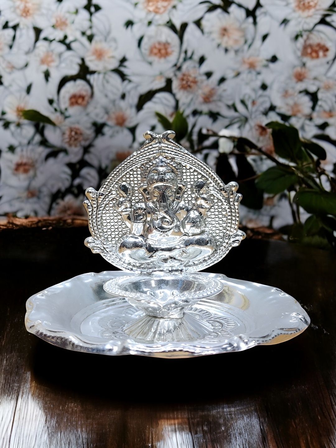 

Sigaram Silvertoned Glossy Brass Ganesh Diya, Silver