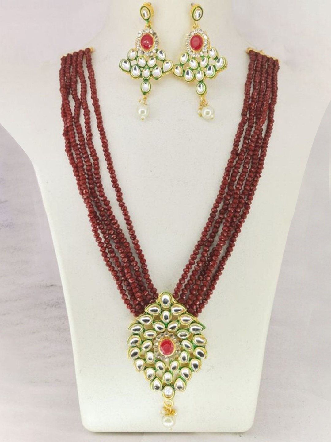 

Gyaan Jewels Gold-Plated Stone-Studded & Beaded Jewellery Set