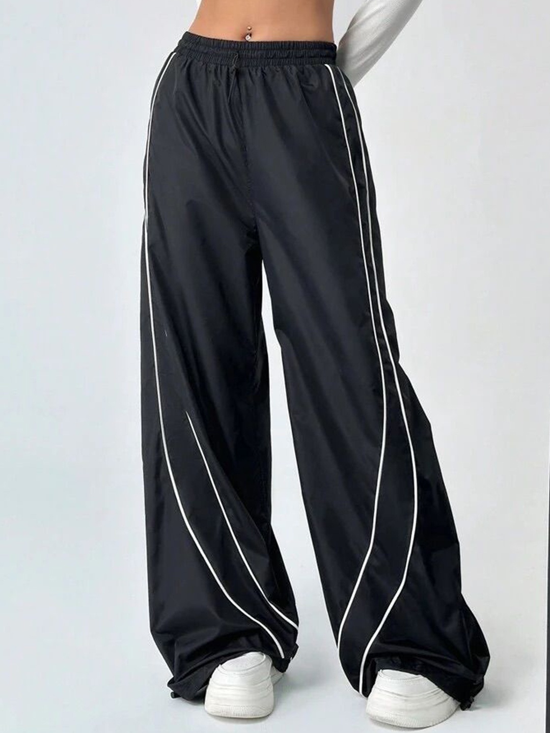 

SAAHASAM Women Striped Relaxed Loose Fit Trousers, Black