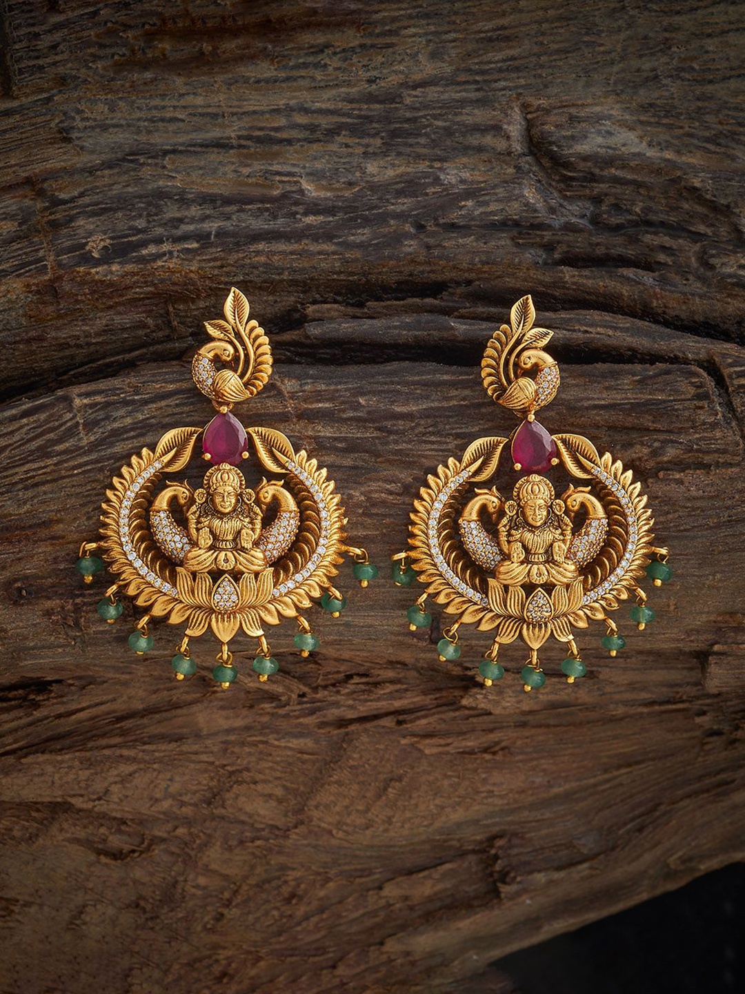 

Kushal's Fashion Jewellery Gold Plated Ruby Studded Peacock Shaped Antique Drop Earrings, Red