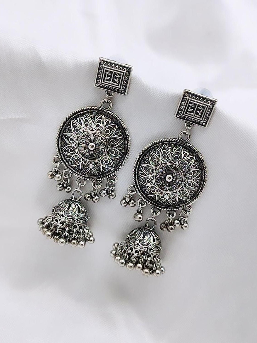 

Gyaan Jewels Stone-Studded Dome Shaped Jhumkas, Black