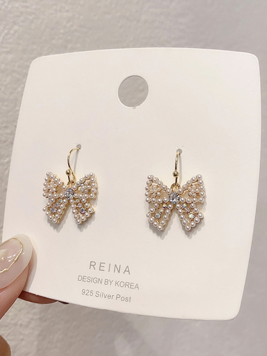 

DESTINY JEWELS Gold-Plated CZ Studded Bow Detail Drop Earrings