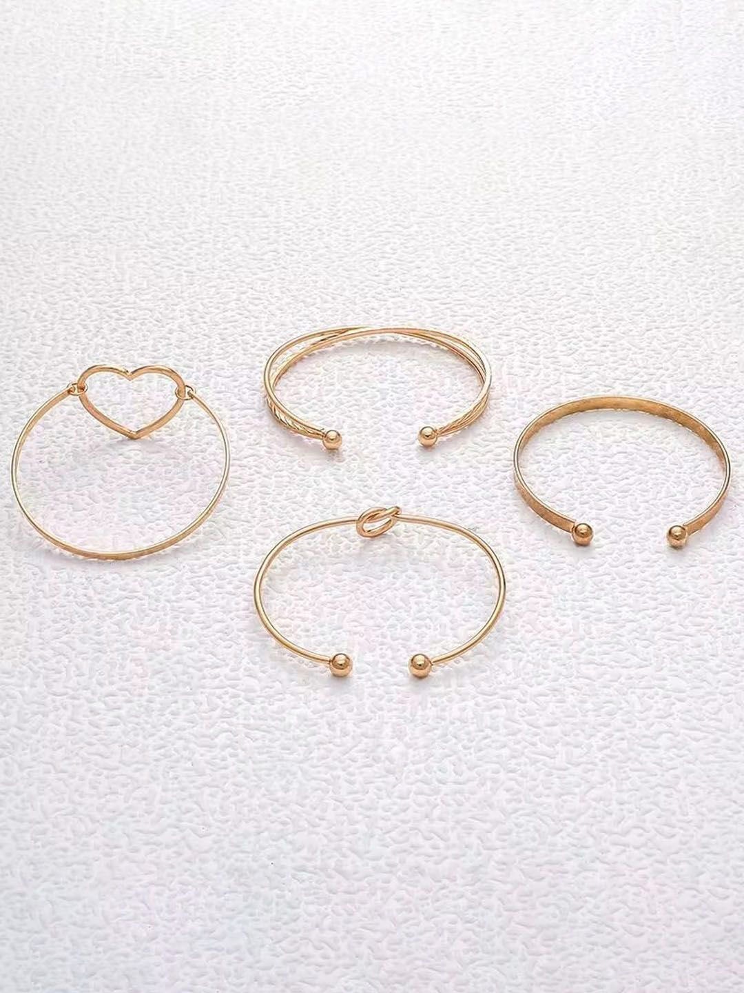 

Jewels Galaxy Set Of 4 Gold-Plated Charm Bracelet