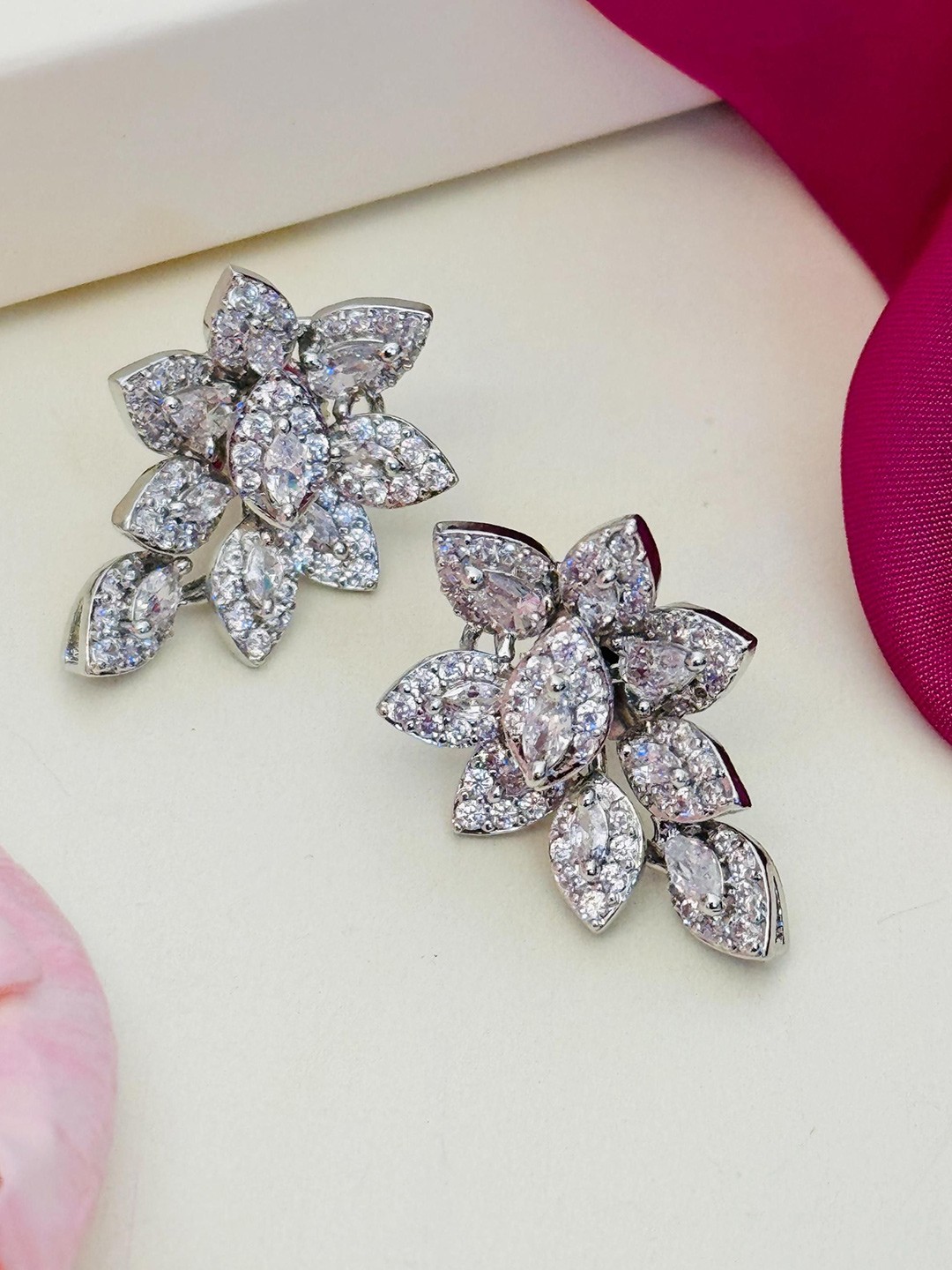 

ABDESIGNS Silver Plated American Diamond Studded Floral Studs Earrings