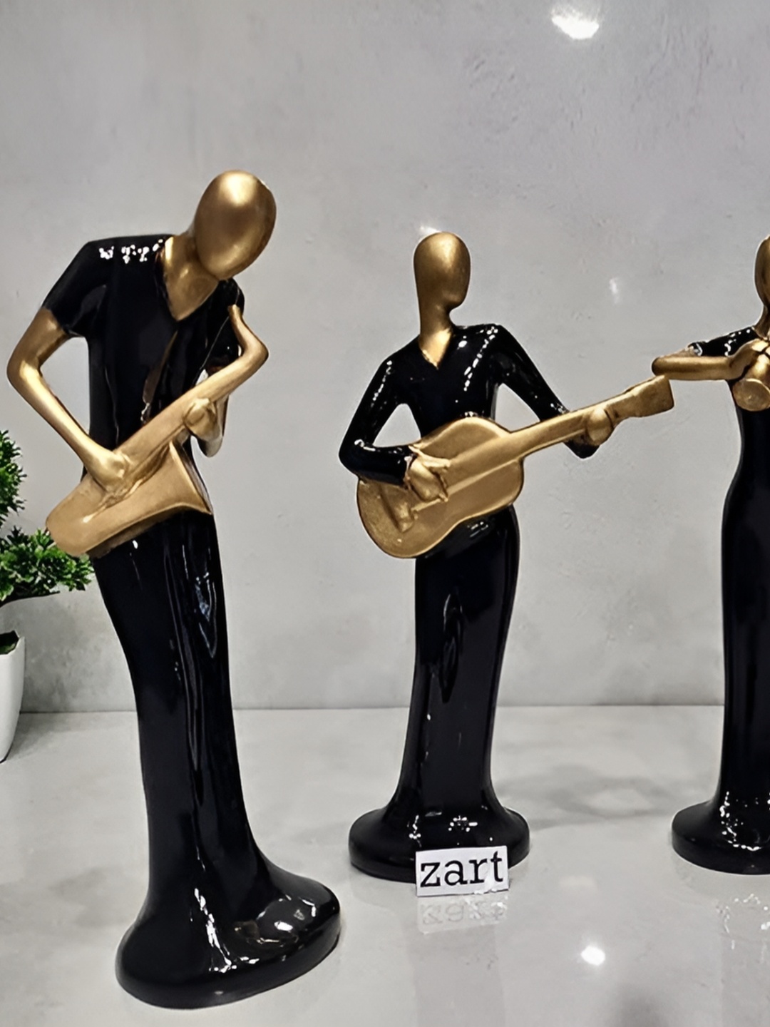 

Zart Black 4 Pieces Figurine Showpiece