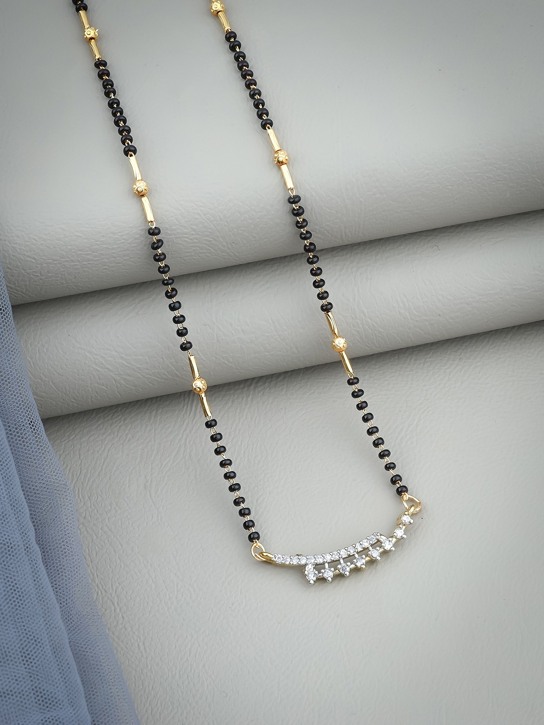 

Wynona Gold-Plated American Diamond Studded and Beaded Mangalsutra