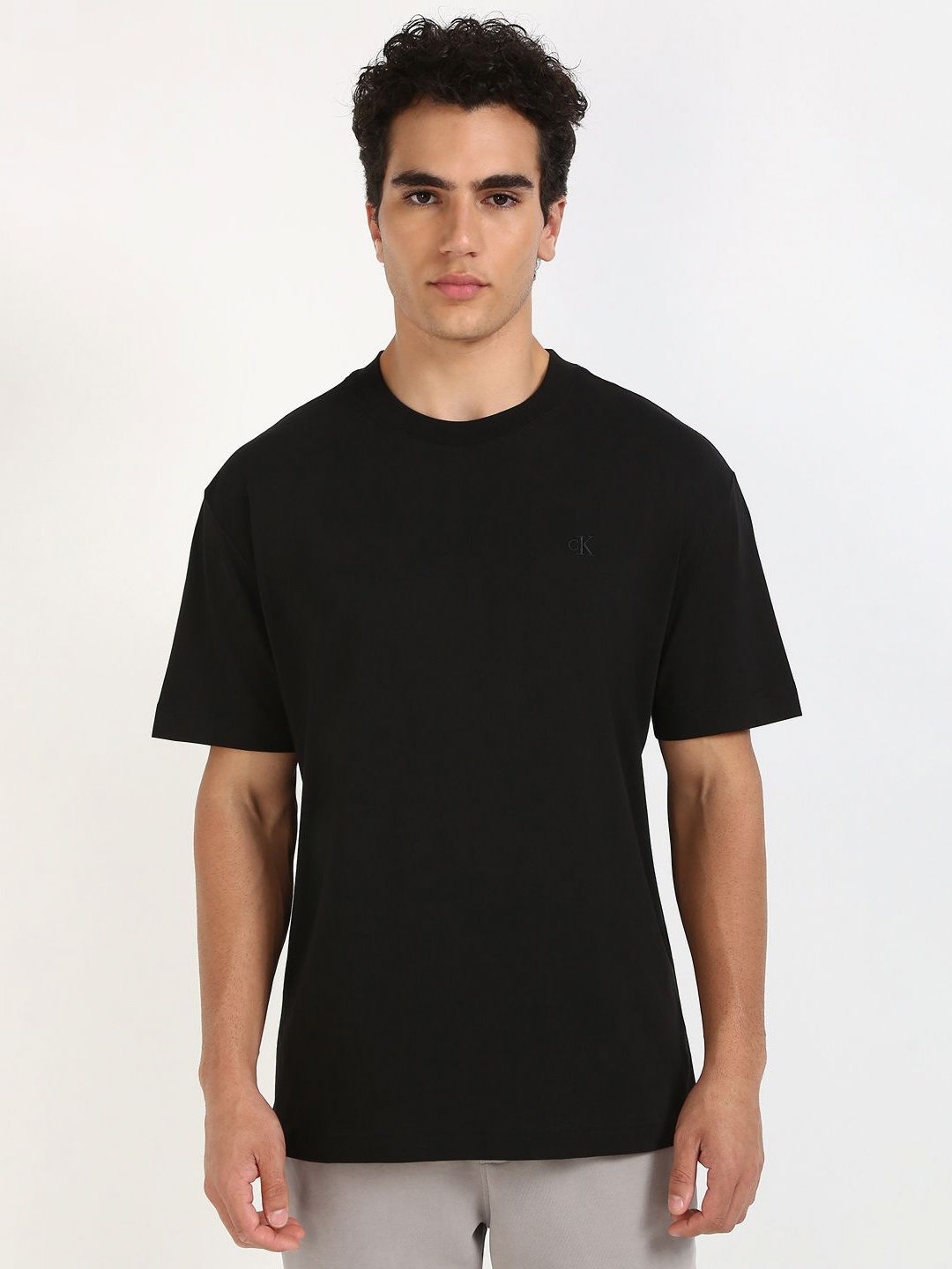 

Calvin Klein Jeans Men Graphic Printed Oversized T-shirt, Black