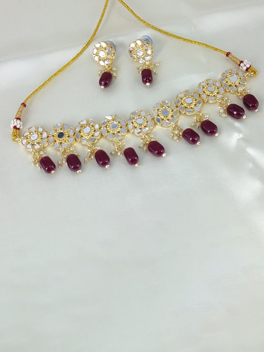 

Gyaan Jewels Gold-Plated Mirror Stone Studded & Beaded Jewellery Set