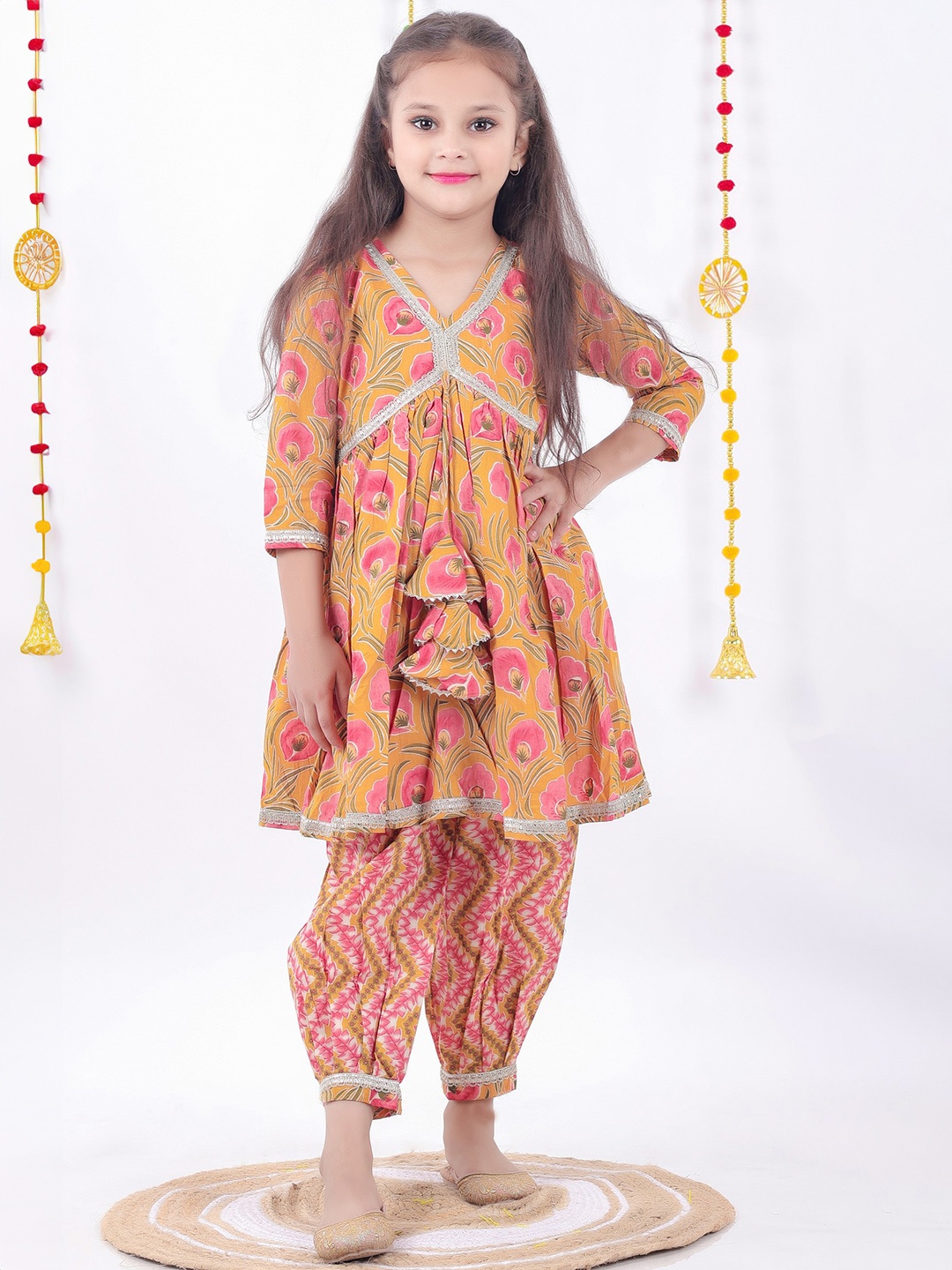 

AATYA KIIDS Girls Floral Printed Empire Pure Cotton Kurta with Salwar, Mustard