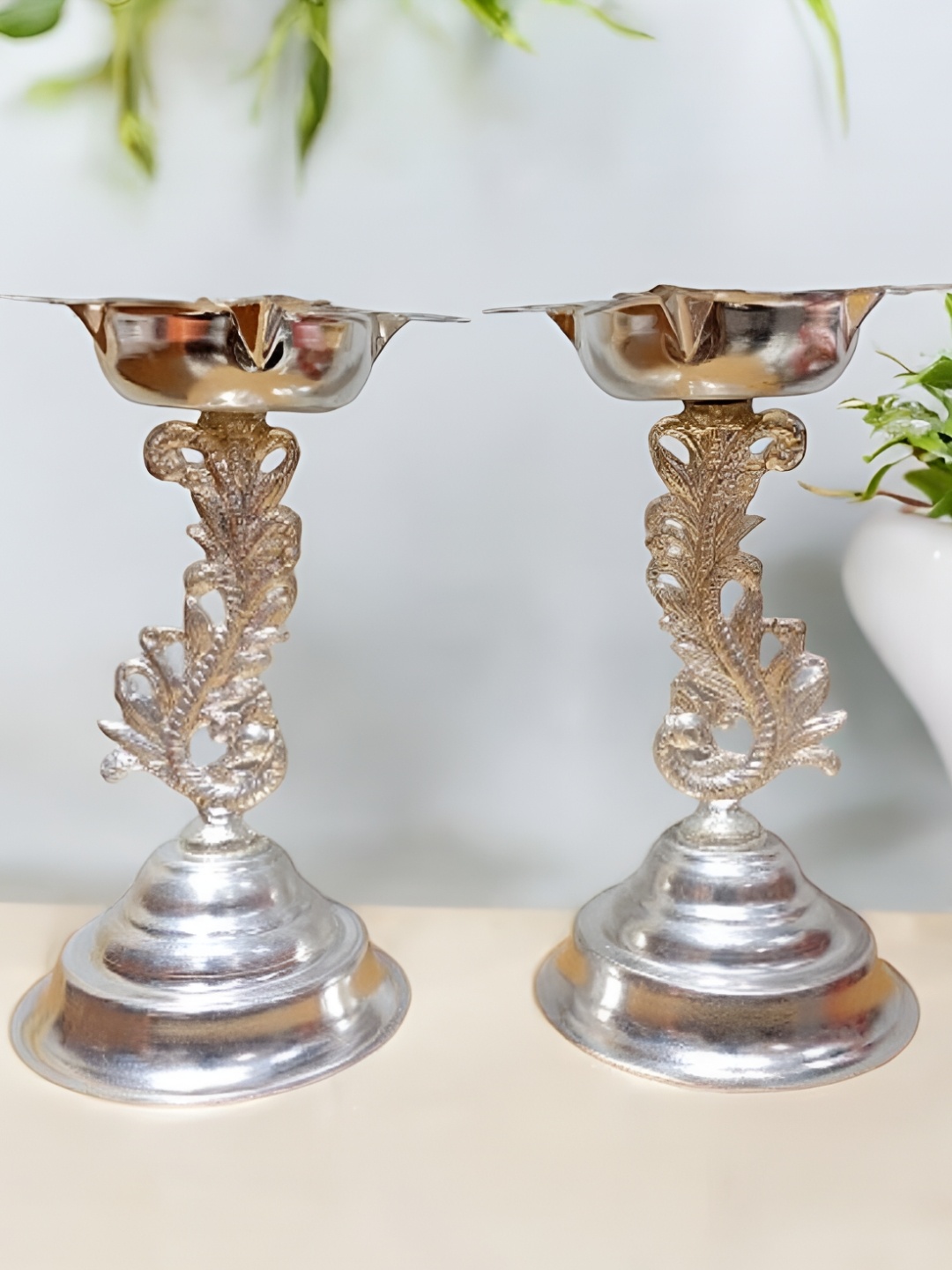 

Sigaram Silvertoned 2 Pcs Glossy Pure German Silver Peacock Diyas