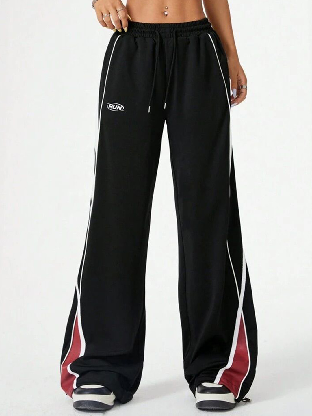 

SAAHASAM Women Striped Relaxed Loose Fit Trousers, Black
