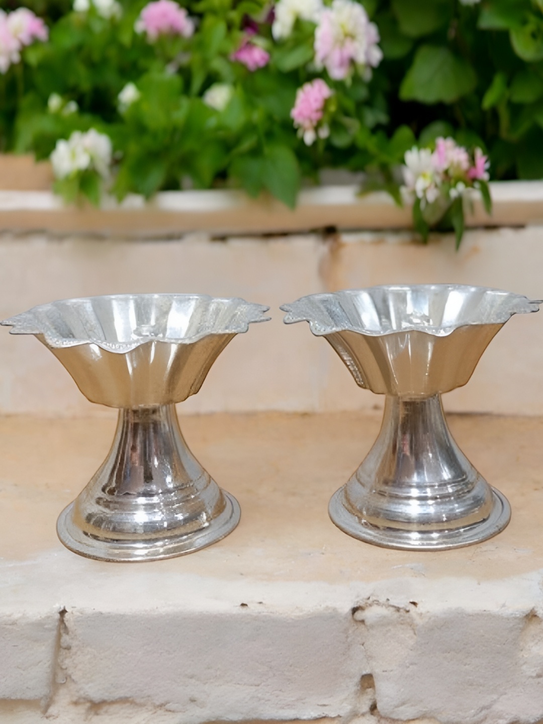 

Sigaram Silvertoned 2 Pcs Glossy Brass Flower Diyas, Silver