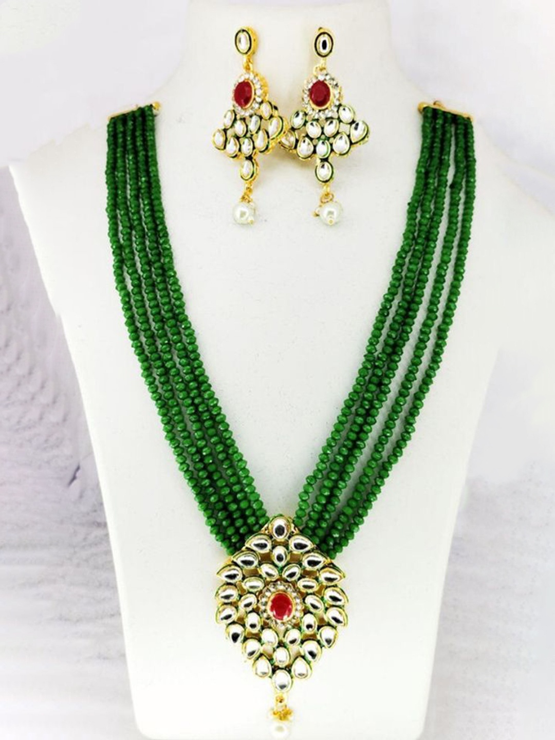 

Gyaan Jewels Gold Plated Artificial Stones and Beads Jewellery Set