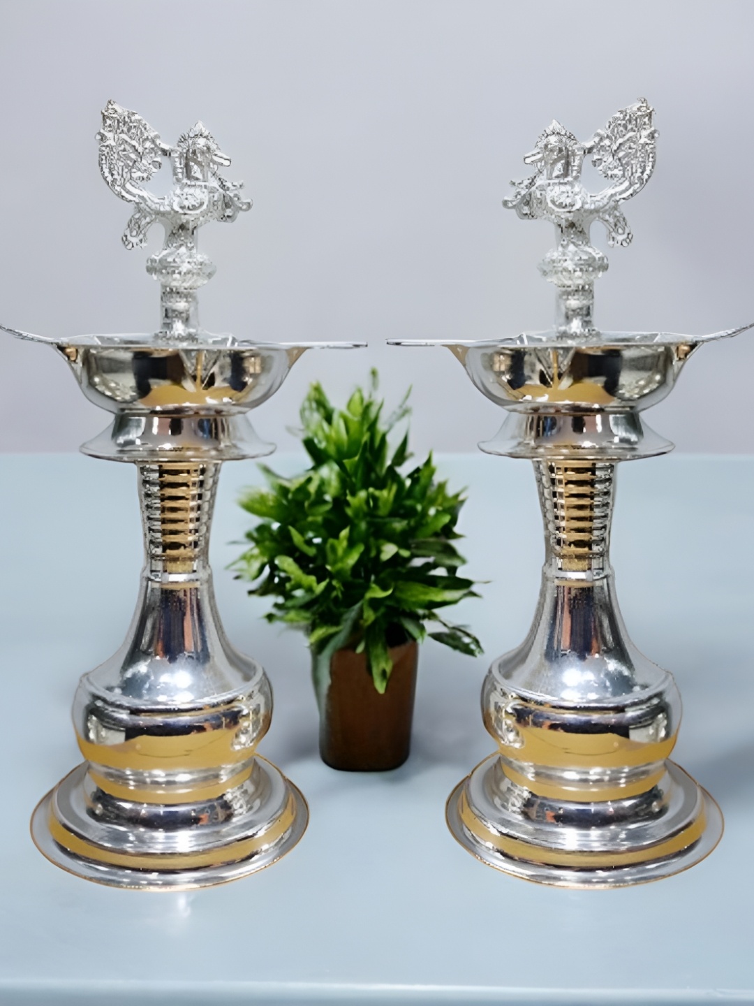 

Sigaram Silvertoned 2 Pieces Glossy Pure German Silver Peacock Diyas
