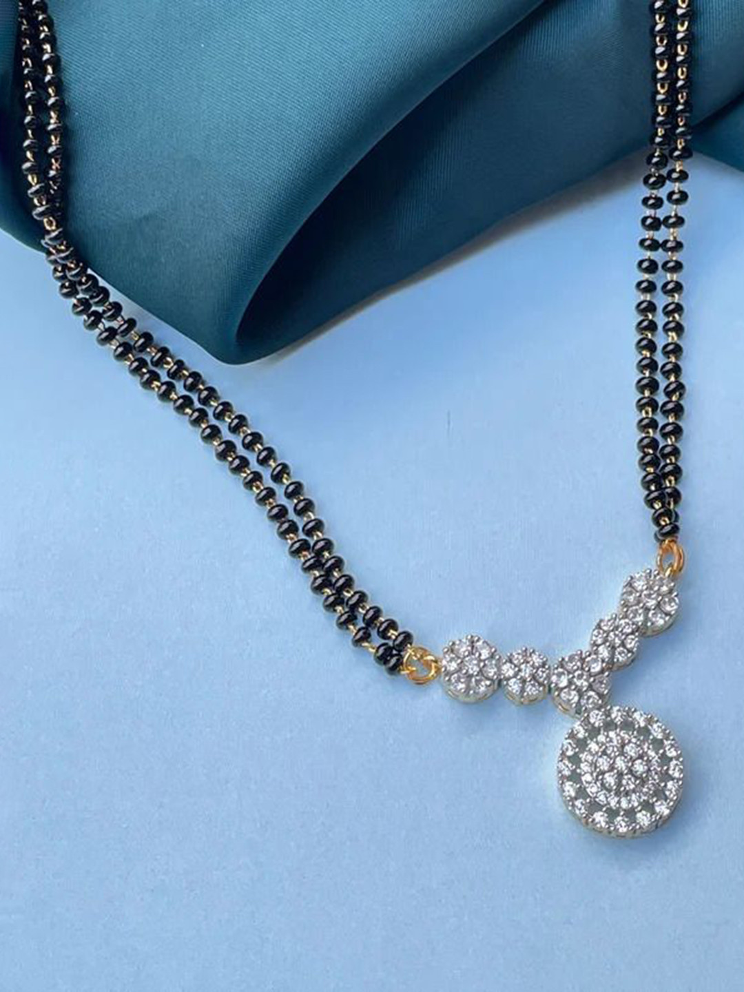 

Wynona Gold-Plated American Diamond Studded & Beaded Mangalsutra