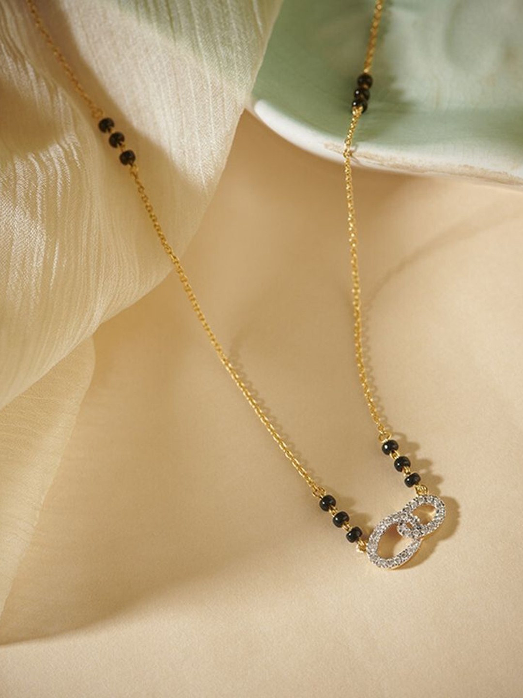 

Wynona Set Of 2 Gold-Plated American Diamond Studded & Beaded Mangalsutra