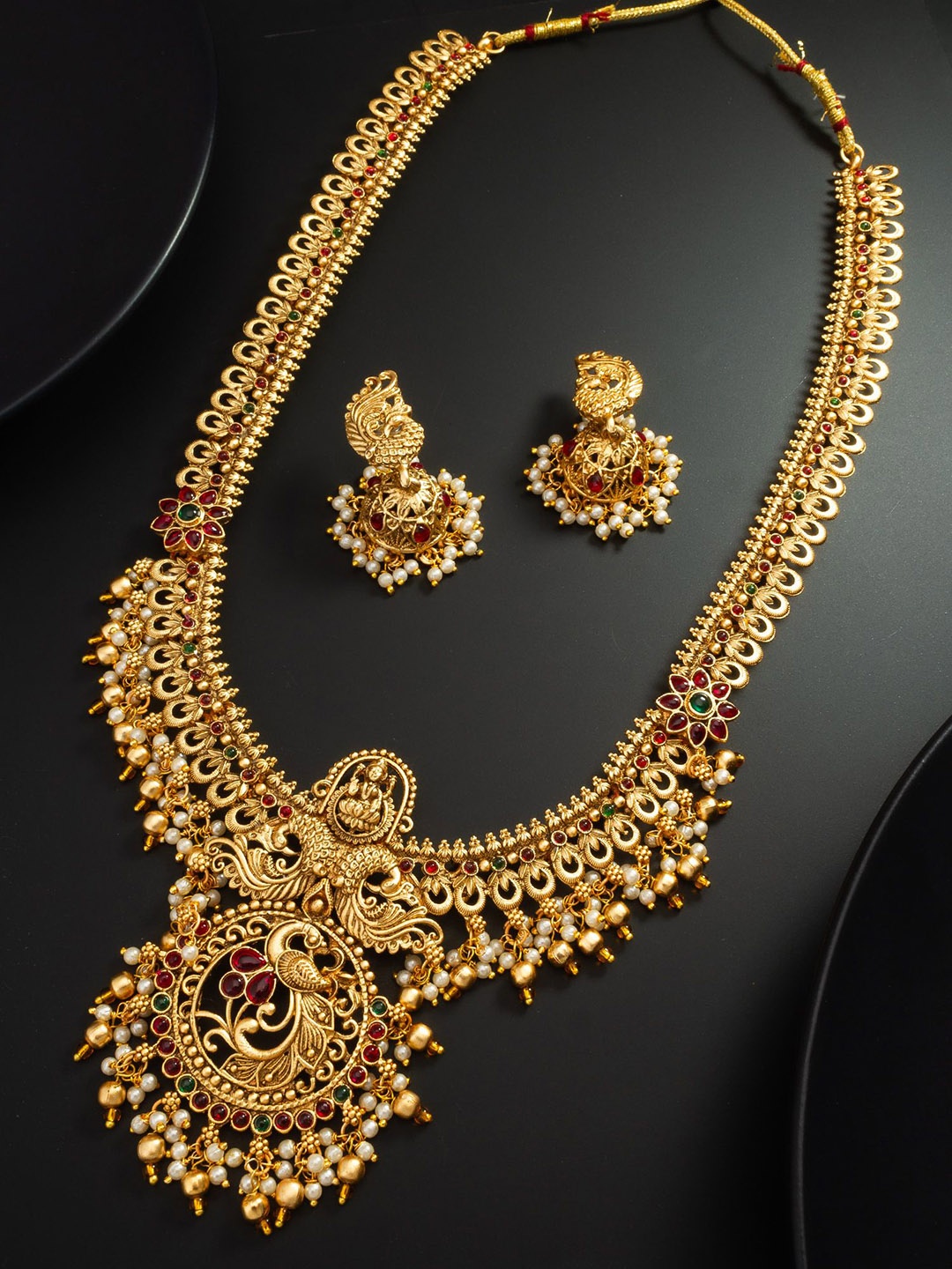 

aadita Gold-Plated Kundan-Studded & Beaded Matinee Temple Jewellery Set