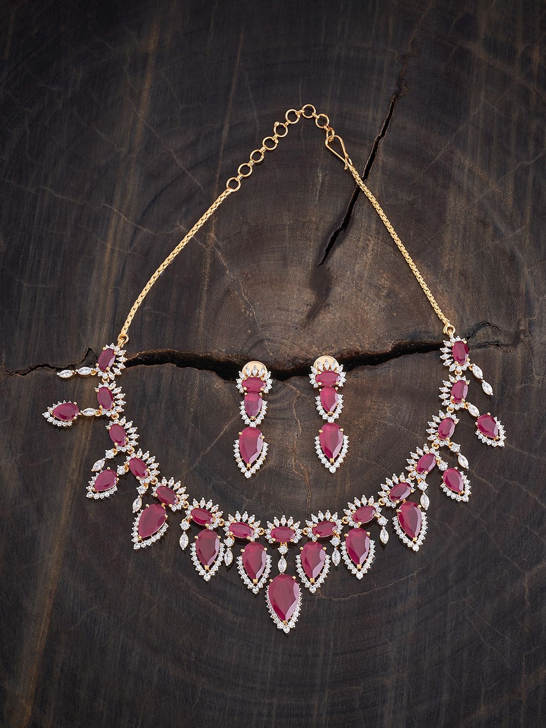 

Kushal's Fashion Jewellery Gold Plated CZ Stone Studded Necklace and Earrings