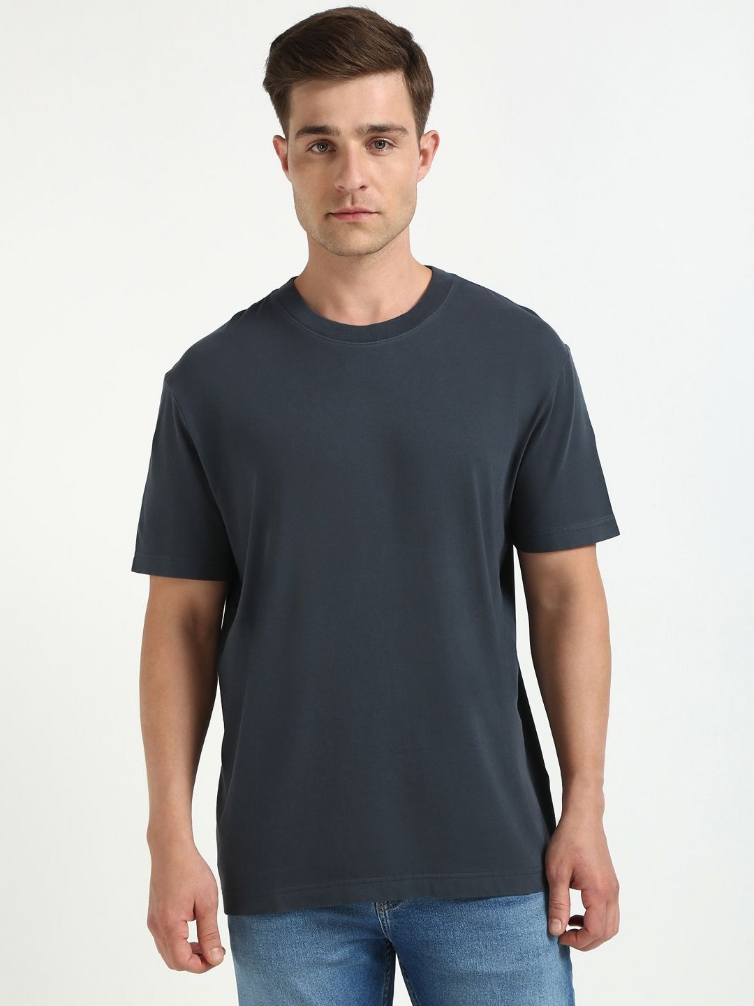 

Calvin Klein Jeans Men Solid Round Neck Cotton T-shirt, Navy blue