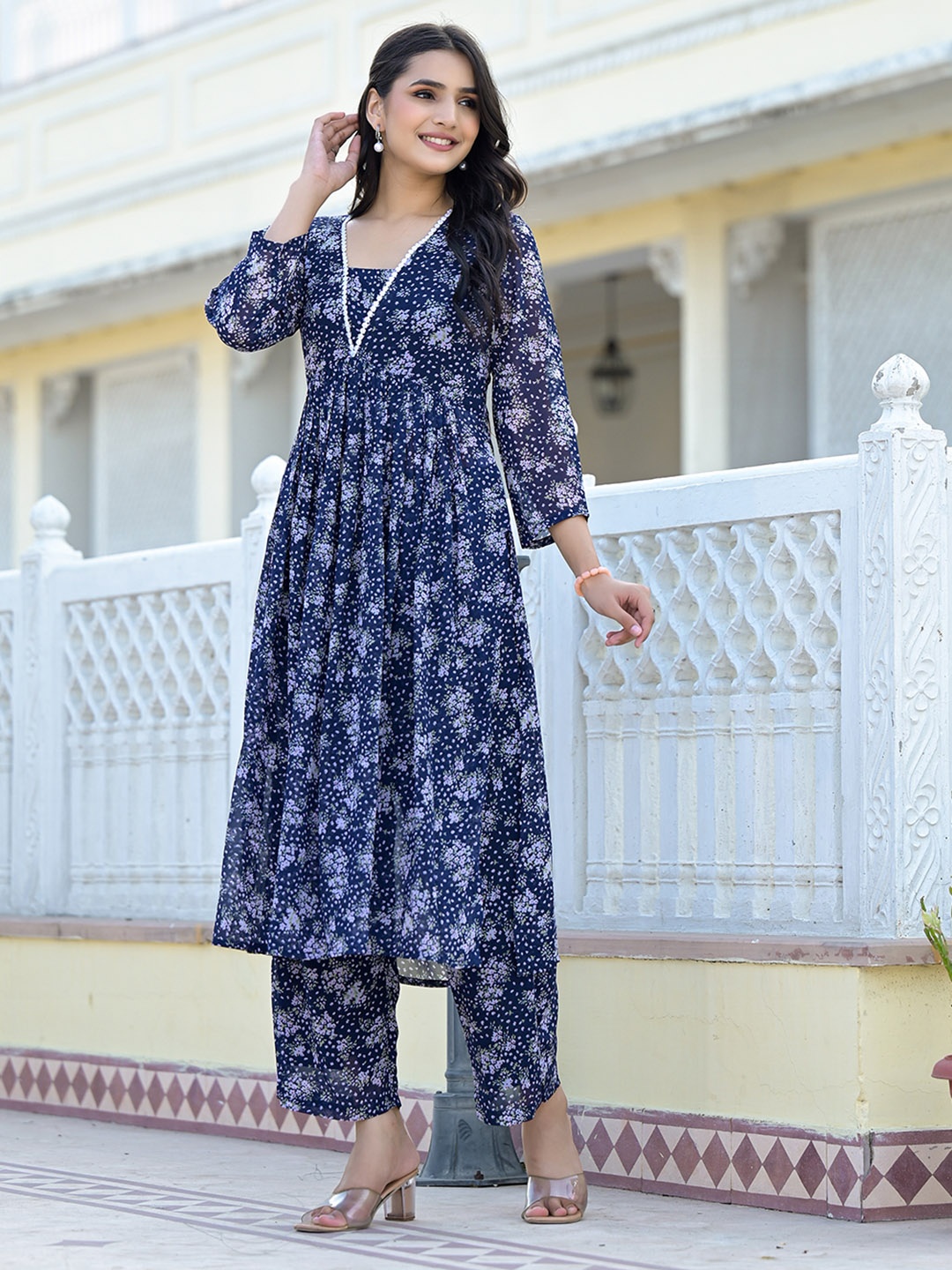 

Varanga Navy Blue Floral Printed Empire Silk Georgette A-Line Kurta With Trouser